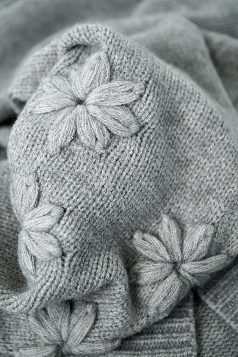 Trui met een bloemen touch